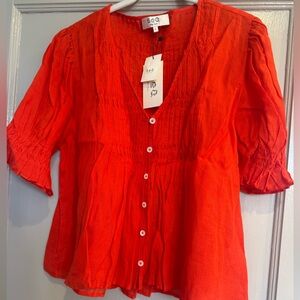 SEA NEW YORK ZORA pleated short sleeve top in chili orange size Large NWT